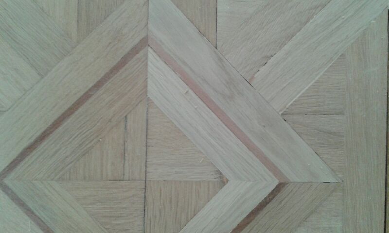 Réfection d’un vieux parquet en marqueterie avec changement de pièces à Marseille